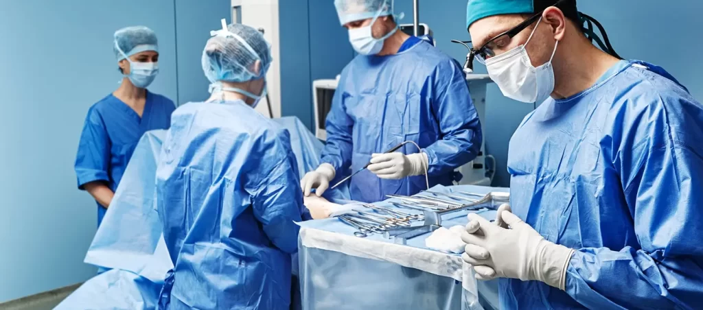 Surgical medical team performing surgical operation in modern operating room